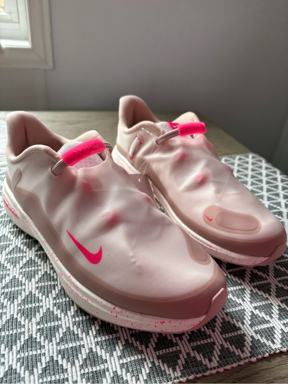 Nike Light Pink Slip-On Sneakers with Hot Pink Accents